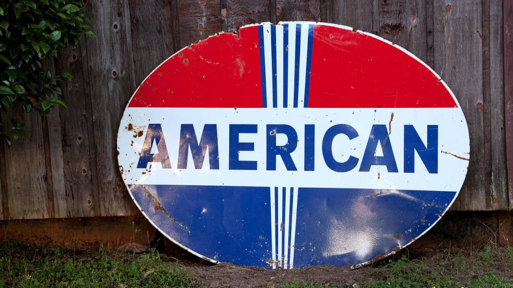 american-in-red-white-and-blue-on-sign--with-text-why-dog-treats-made-in-usa-doesn't-always-equal-quality