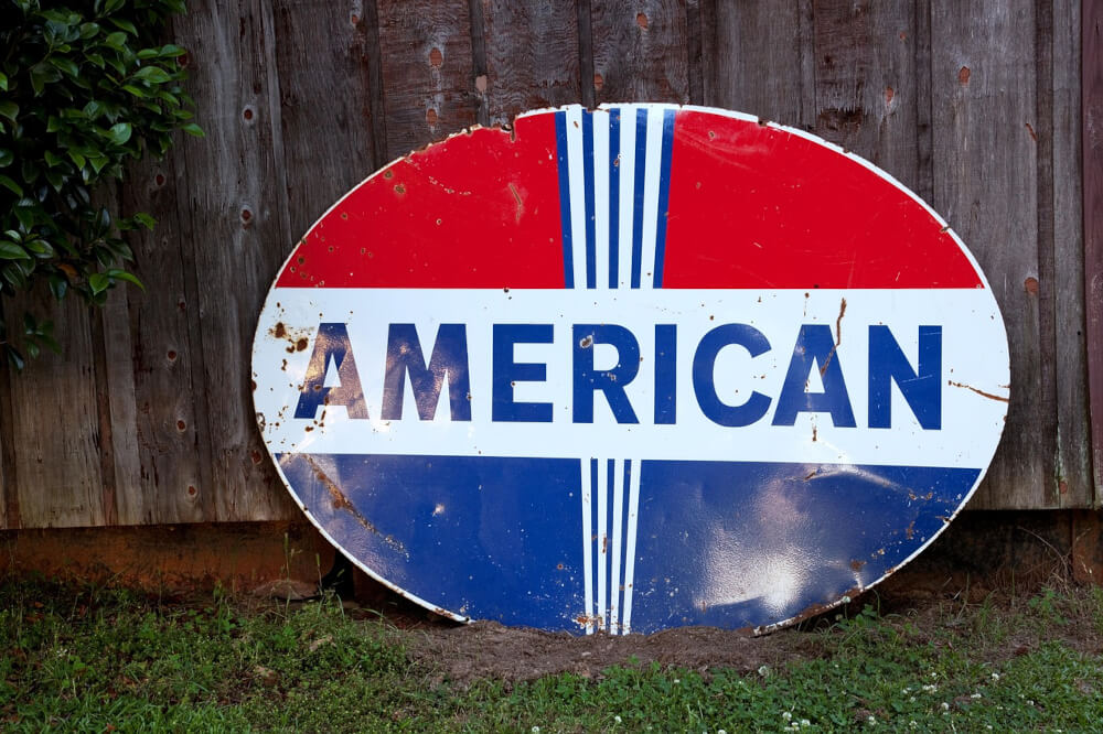 american-in-red-white-and-blue-on-sign--with-text-why-dog-treats-made-in-usa-doesn't-always-equal-quality